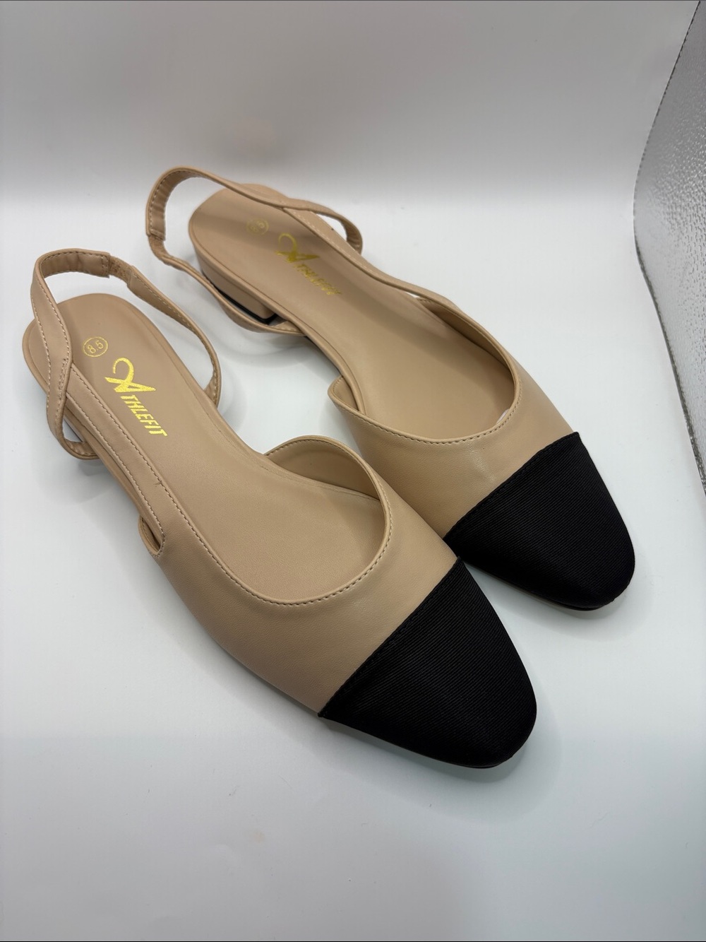 Neutral Beige and Black Two-Tone Slingback Flats by XINEFIT